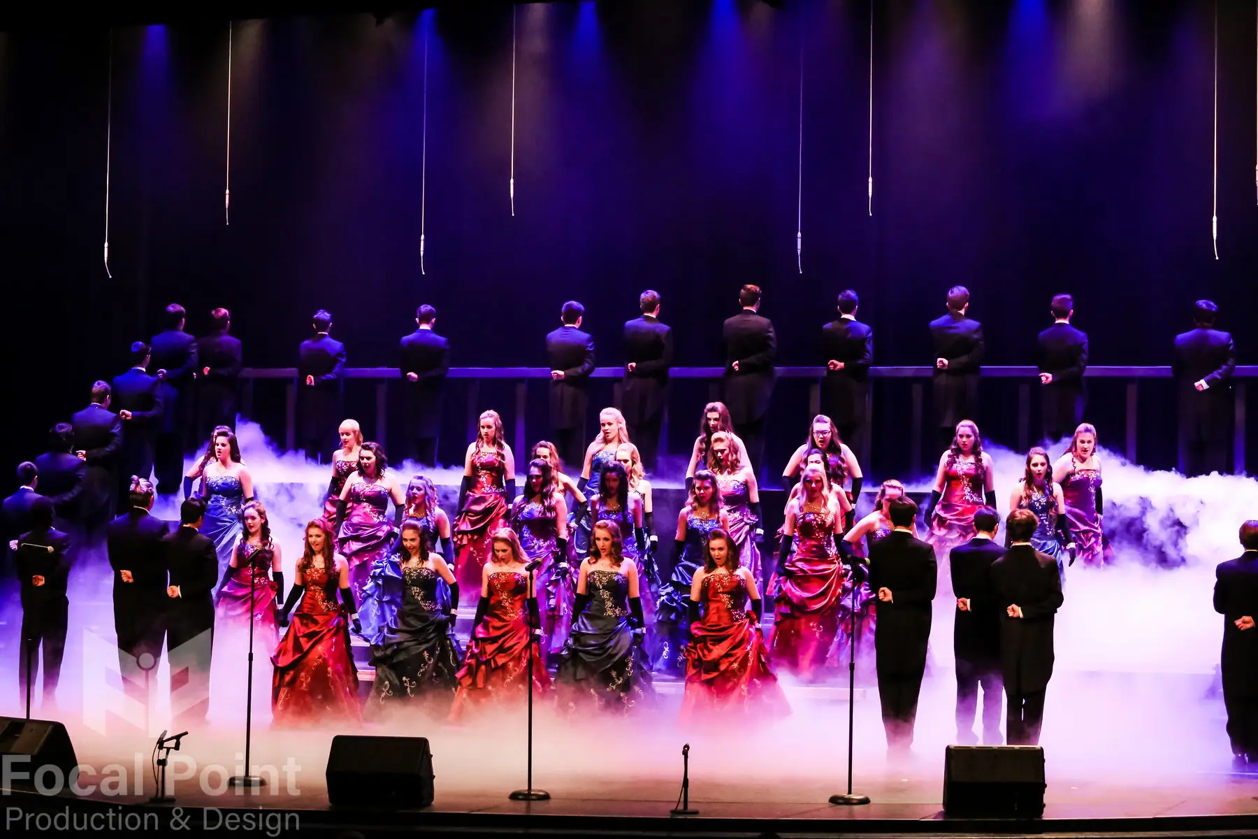 Low-lying fog machine for a show choir creating a haunting dream-like atmosphere